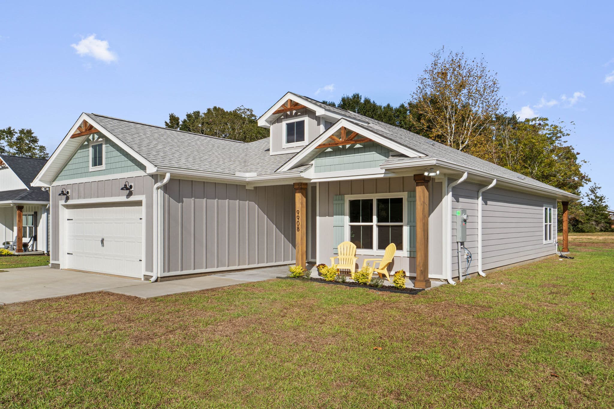 Single-story home with a new shingle roof and gutters