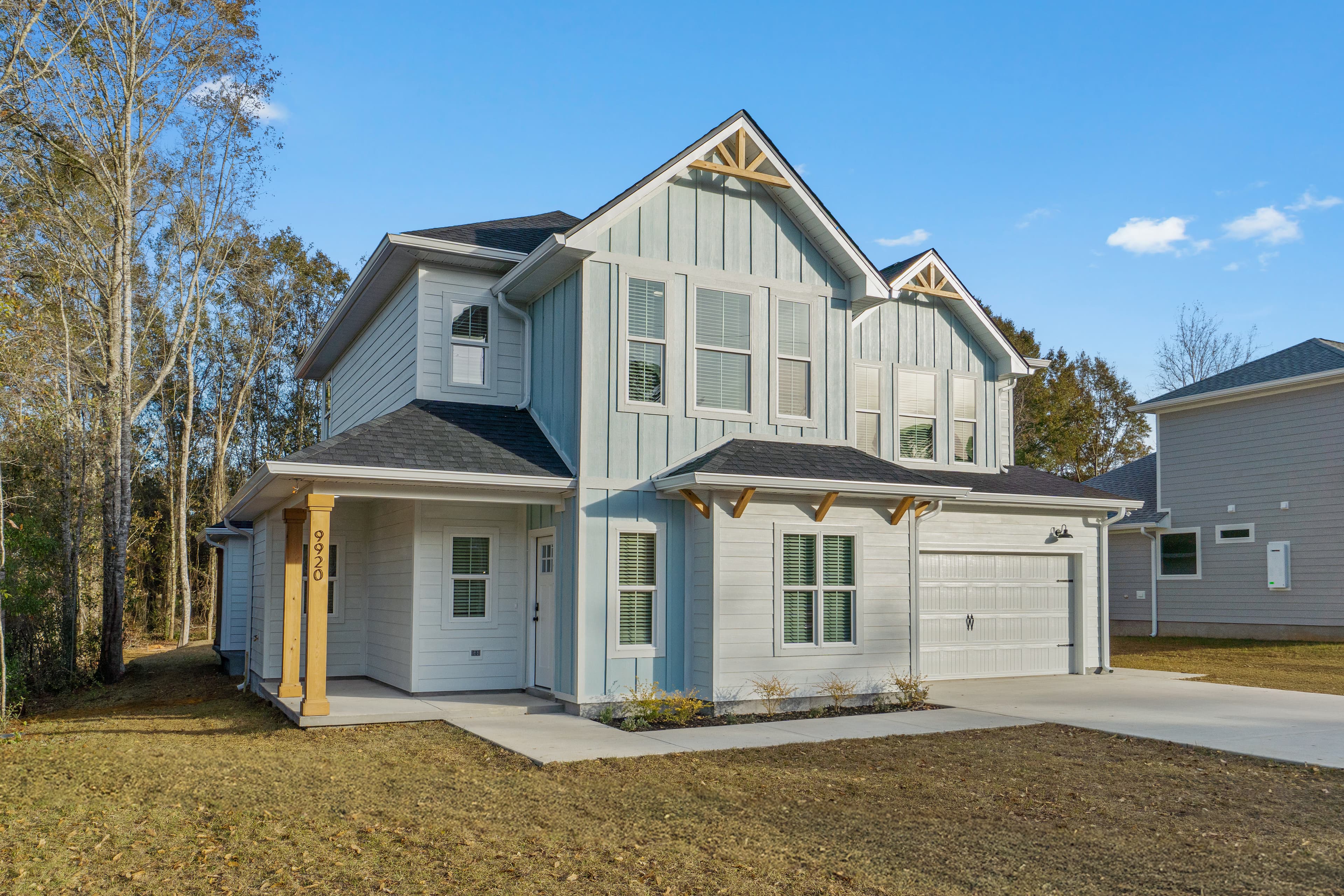 Exterior of a home with new shingles and trim